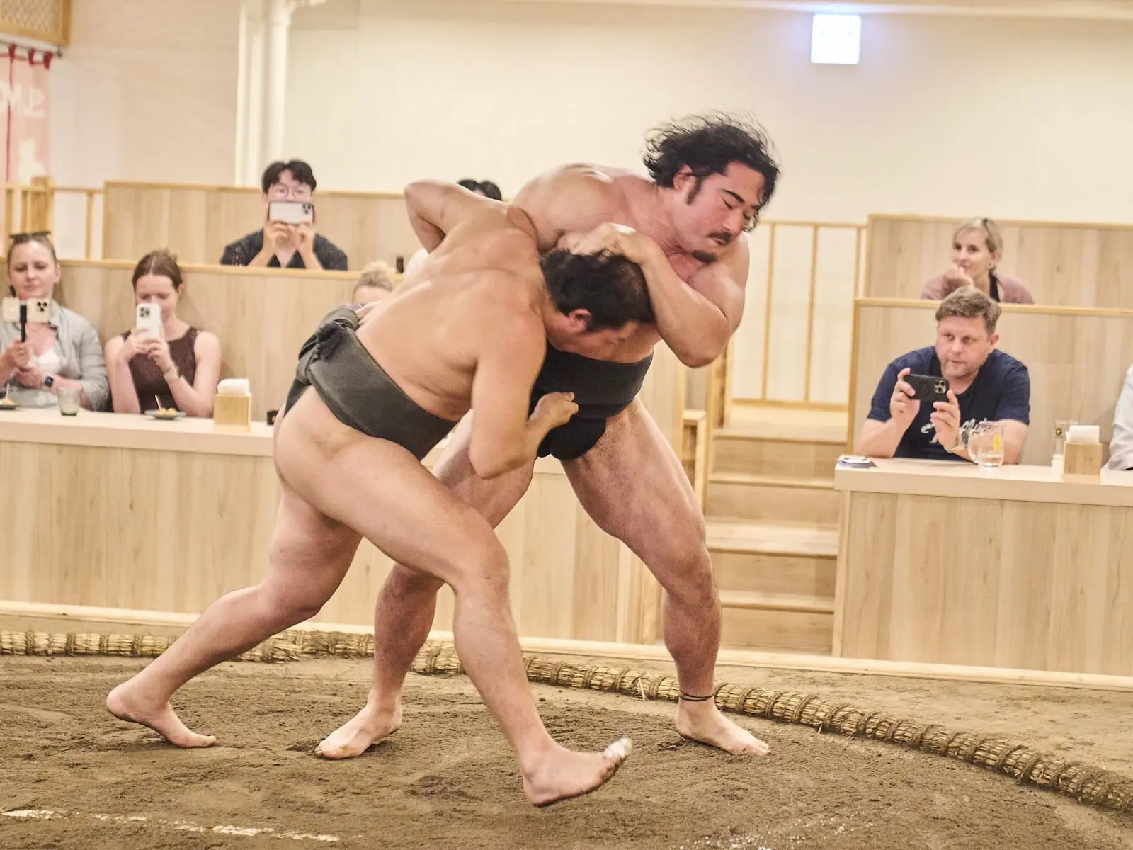 Guests experiencing sumo culture